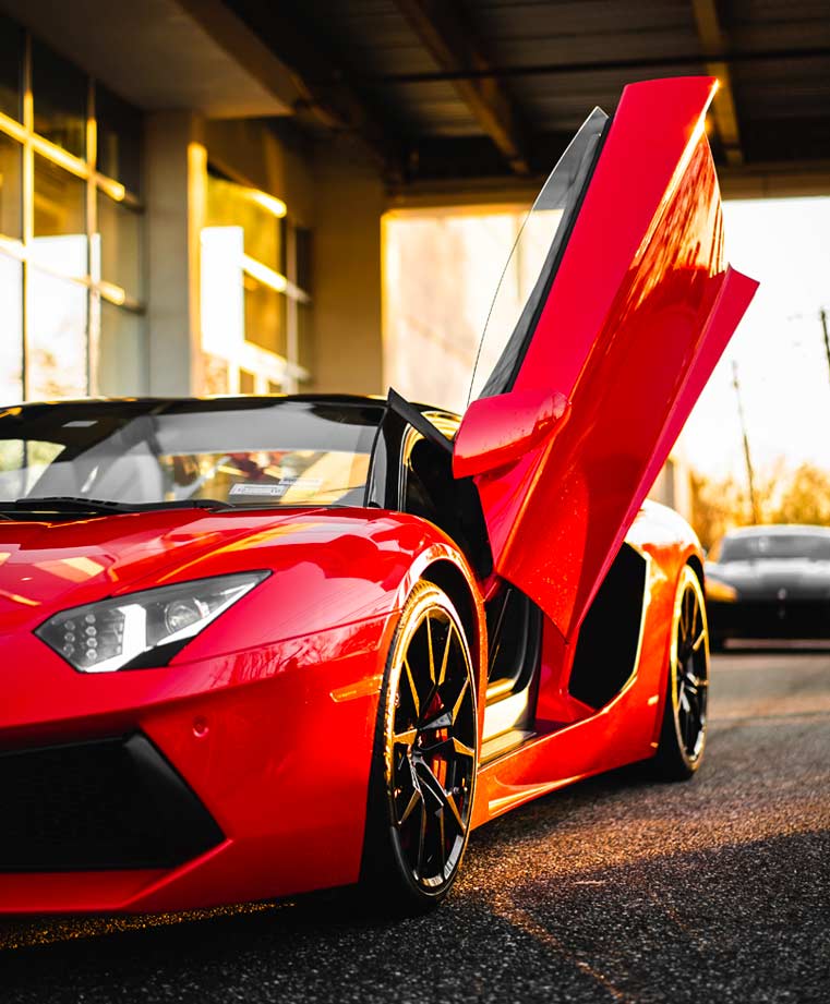 Starr Luxury Cars - Ferrari Spider - Best Coveted Luxury Exotic Cars - Book, Hire, Rent Chauffeur Service, and Self-Hire Service. Mayfair UK - London Berkeley Square. Author: Brandon Atchinson Unsplash.com