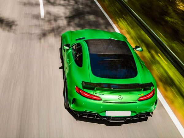 Green colour Mercedes Benz AMG GTR from the back