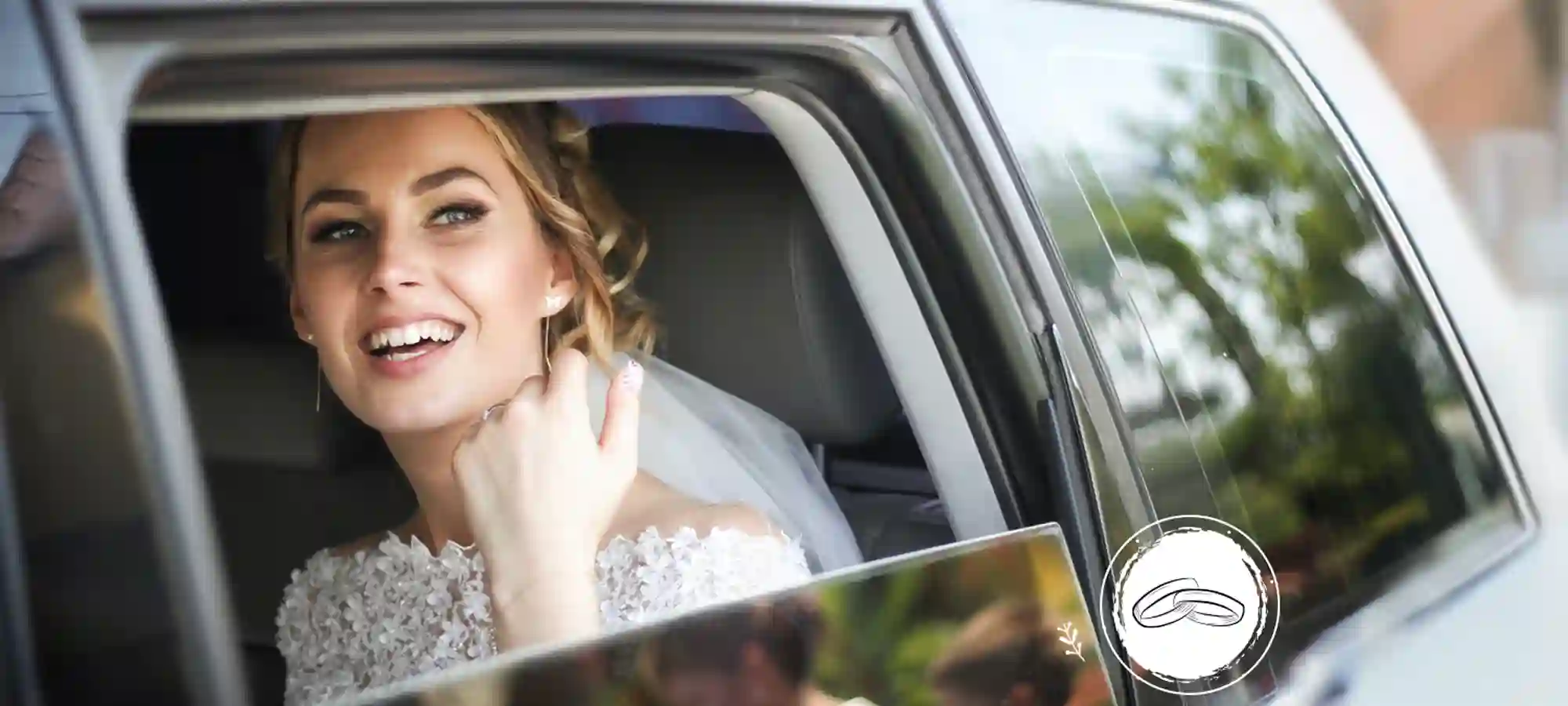 Beautiful bride on the back seat of a Luxury car
