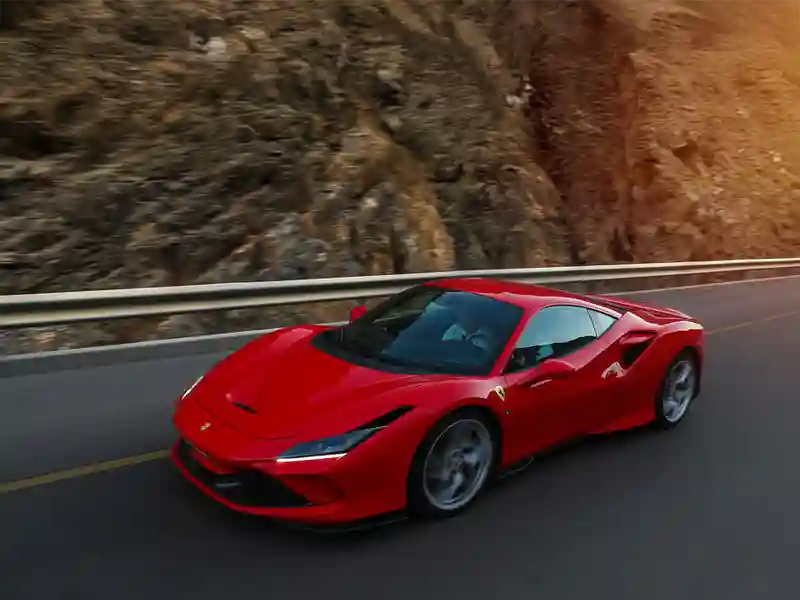 Red Ferrari on the road