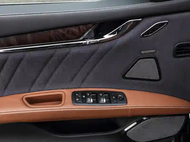 Brown interior of the Aston Martin front door