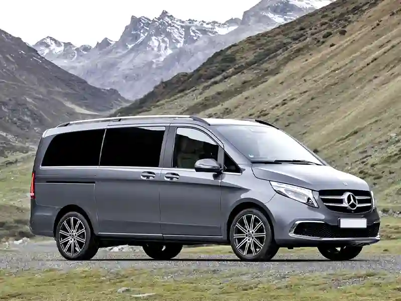 Side view in the mountains of the Mercedes Benz V Class grey colour