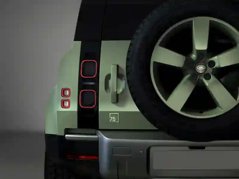 Green Land Rover Defender back view
