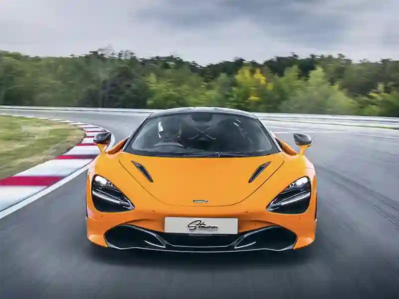 McLaren 720S Electric orange colour, in Barcelona road