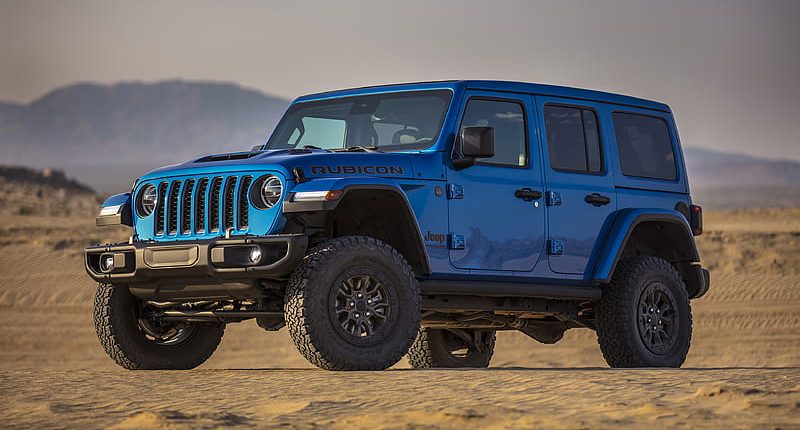 Jeep Wrangler Rubicon blue side parked