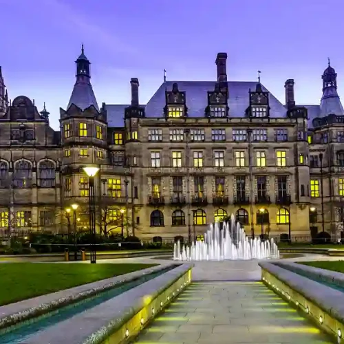 Classic old building with a water font